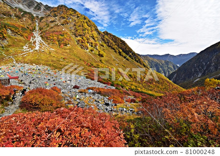 Karasawa Cirque at the peak of autumn colors, Oku Hotakadake, Jonen Mountains and tent site seen from the vicinity of Karasawa Hutte 81000248