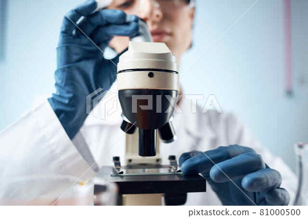 woman scientist laboratory microscope research woman scientist laboratory microscope research 81000500