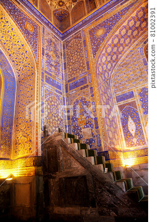 Fragment of a richly decorated wall inside the Sherdor Madrasah on Registan Square in Samarkand. 29.04.2019 Fragment of a richly decorated wall inside the Sherdor Madrasah on Registan Square in Samarkand. 29.04.2019 81002391