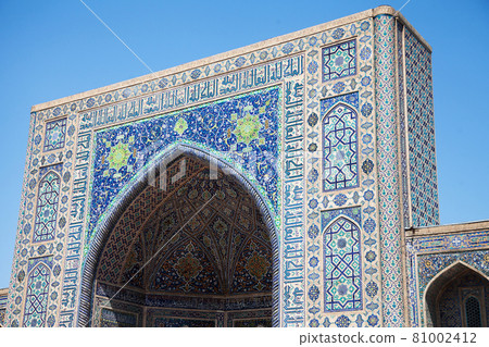 Fragment of the facade of the Tillya-Kari Madrasah, decorated with mosaics, on Registan Square in Smarkand in Uzbekistan. 29.04.19 Fragment of the facade of the Tillya-Kari Madrasah, decorated with mosaics, on Registan Square in Smarkand in Uzbekistan. 29.04.19 81002412
