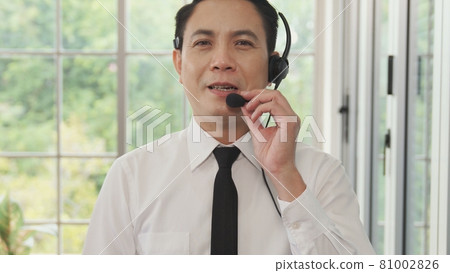 Video call camera view of businessman talks actively in videoconference Video call camera view of businessman talks actively in videoconference 81002826
