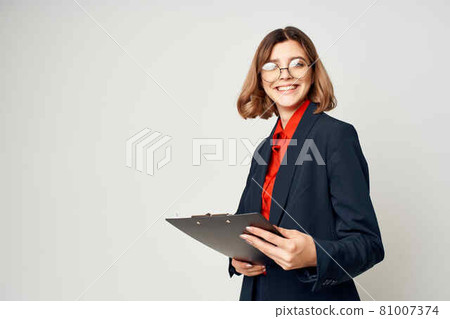 cheerful business woman in a suit with documents emotions work manager 81007374