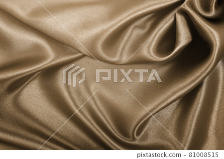Smooth elegant brown silk or satin texture as abstract background. Luxurious background design. In Sepia toned. Retro style Smooth elegant brown silk or satin texture as abstract background. Luxurious background design. In Sepia toned. Retro style 81008515