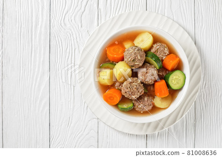 hot mexican meatball vegetable soup, top view 81008636