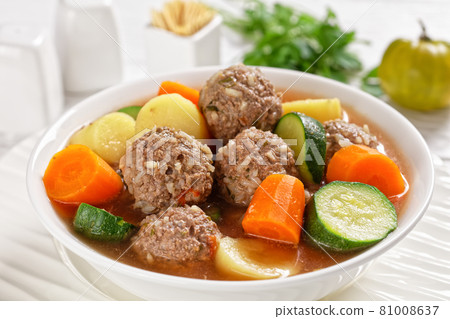 hot mexican meatball vegetable soup, top view 81008637