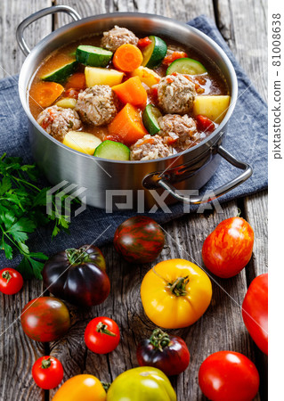 hot mexican meatball vegetable soup, top view 81008638