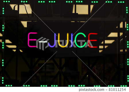 Colorful Neon E-Juice Sign in Smoke Shop Window Colorful Neon E-Juice Sign in Smoke Shop Window 81011254