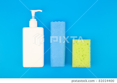 Detergent, dust cloth and cleaning sponge on blue background Detergent, dust cloth and cleaning sponge on blue background 81014400