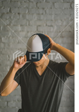 Men in T-shirts and caps Men in T-shirts and caps 81020271