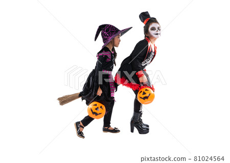 Portrait pair of little girls in Halloween and carnival costume isolated on white background Portrait pair of little girls in Halloween and carnival costume isolated on white background 81024564
