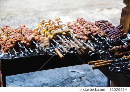 Meat and potatoes prepared for frying on skewers. Meat and potatoes prepared for frying on skewers. 81026324
