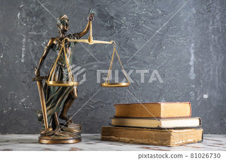 Scales of Justice, Lady Justice, law library concept, Law books in the background. 81026730