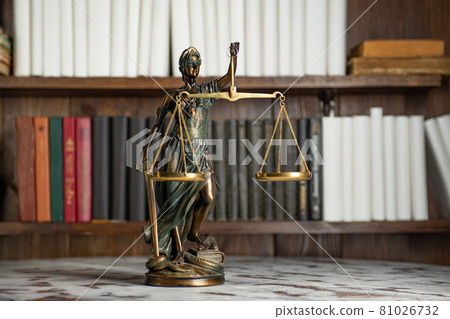 Scales of Justice, Lady Justice, law library concept, Law books in the background. 81026732