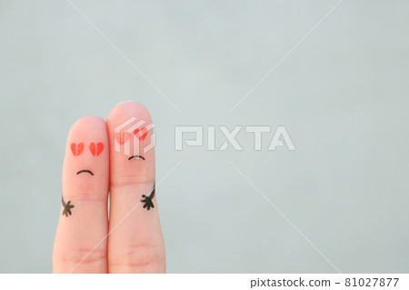 Fingers art of sad couple. Man and woman hug with broken hearts in eyes. 81027877