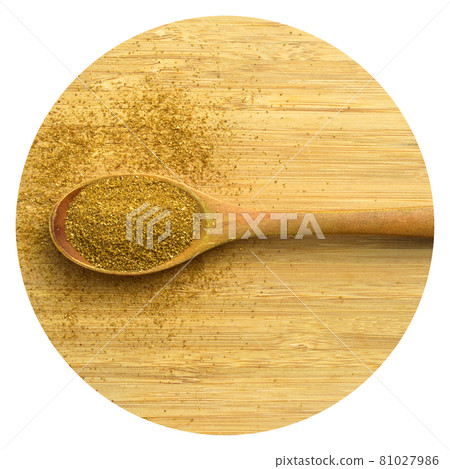Aromatic fragrant organic cumin powder spice, bamboo in wooden spoon on cutting board Aromatic fragrant organic cumin powder spice, bamboo in wooden spoon on cutting board 81027986
