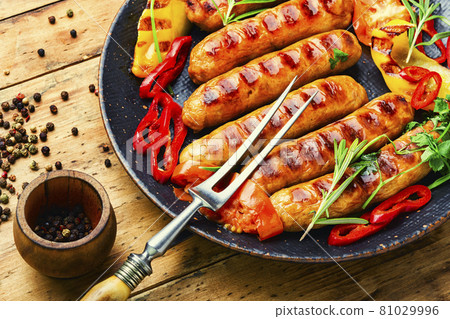 Delicious grilled sausages Delicious grilled sausages 81029996