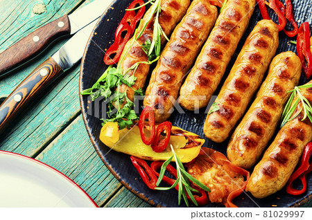 Fried sausages with bell pepper Fried sausages with bell pepper 81029997