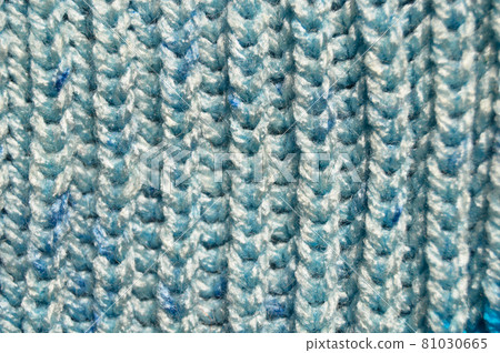 Handmade knitted fabric blue wool background texture Handmade knitted fabric blue wool background texture 81030665