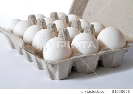 Fresh organic white eggs in a carton package, isolated on white background Fresh organic white eggs in a carton package, isolated on white background 81030666