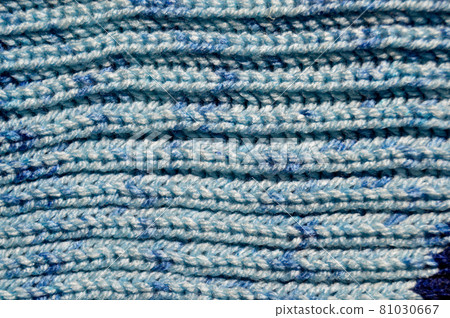 Handmade knitted fabric blue wool background texture Handmade knitted fabric blue wool background texture 81030667