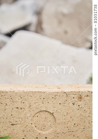 Beige stone podium on a gray background, a natural background for your product Beige stone podium on a gray background, a natural background for your product 81031738