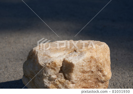 The concept of a summer layout for a product presentation. The platform is made of beige stone on the asphalt. 81031930