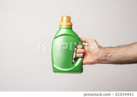 Detergent liquid bottle in front of light gray background mock-up series Detergent liquid bottle in front of light gray background mock-up series 81034941