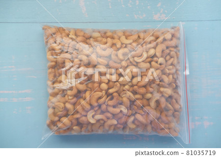 cashew nuts in plastic bag on table cashew nuts in plastic bag on table 81035719
