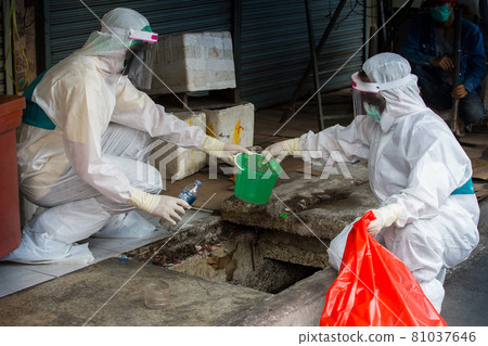 Rangsit Market, Pathum Thani Province in Thailand 17/2/2021 Workers are collecting water samples for COVID-19 infection. Rangsit Market, Pathum Thani Province in Thailand 17/2/2021 Workers are collecting water samples for COVID-19 infection. 81037646
