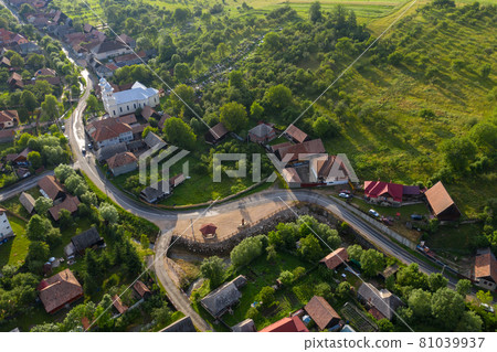 Above aerial view of a village street 81039937