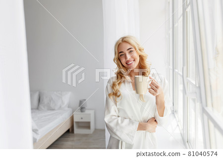 Enjoy wonderful morning at weekend free time or vacation in cozy minimalist loft interior Enjoy wonderful morning at weekend free time or vacation in cozy minimalist loft interior 81040574