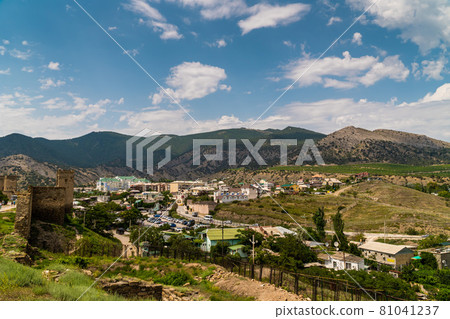 The Republic of Crimea. July 12, 2021. Summer picturesque view of the city of Sudak from the height of the Genoese fortress, located on the Serf mountain. 81041237