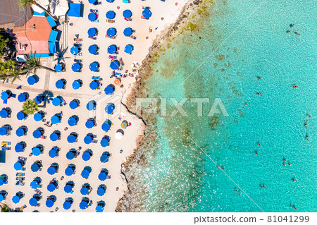Aerial view of sunny sandy Nissi beach. Ayia Napa, Cyprus Aerial view of sunny sandy Nissi beach. Ayia Napa, Cyprus 81041299