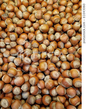 unpeeled hazelnuts. background and texture. agriculture. supermarket 81043060