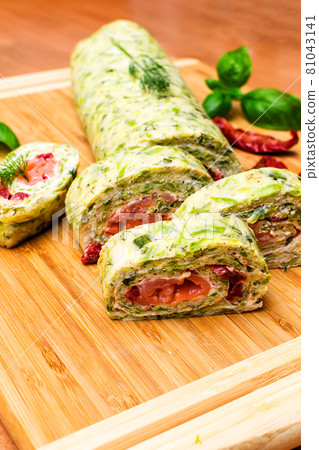 Zucchini roll with cream cheese and salmon Zucchini roll with cream cheese and salmon 81043141