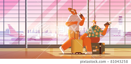 elderly couple of tourists grandparents with luggage holding passports and tickets ready to boarding at airport 81043258