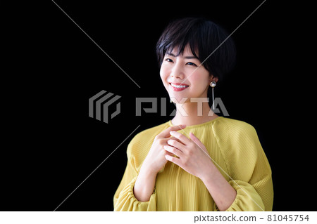 Young woman with short hair black back 81045754