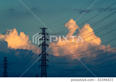 Cumulonimbus clouds rising in the power transmission tower and the blue sky in the evening a-2 High saturation 81046815