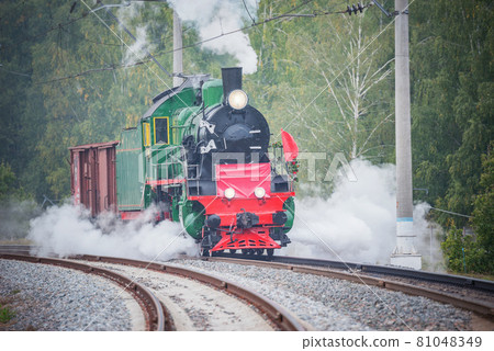 Retro steam train moves. Moscow region. Retro steam train moves. Moscow region. 81048349