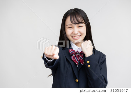 High school girl examinee fighting pose High school girl examinee fighting pose 81051947