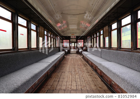 Image of the inside of an old railroad car 81052984