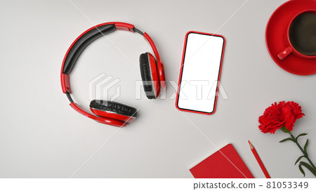 Top view smart phone, headphone and coffee cup on white background. Top view smart phone, headphone and coffee cup on white background. 81053349