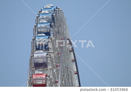 Blue sky and large Ferris wheel Blue sky and large Ferris wheel 81053968