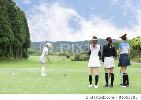 Female tee shot driver enjoying golf 81055595