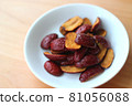 Jujube chips on a plate 81056088