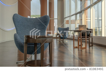 The new normal for common area in condominium. The seats were set separately according to social distancing policy for the spread of covid-19 prevention. 81063491