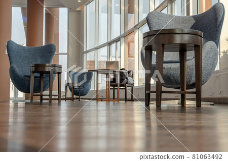 The new normal for common area in condominium. The seats were set separately according to social distancing policy for the spread of covid-19 prevention. 81063492