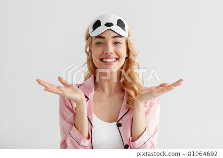 Portrait of positive female blogger model, wake up in morning has good mood 81064692