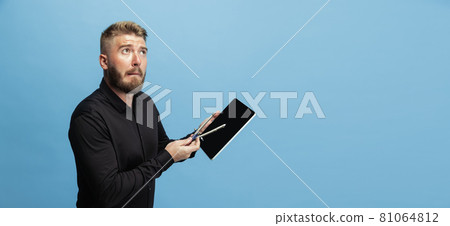 Portrait of funny bearded man, builder, designer or architect with professional equipment isolated on white studio background. Portrait of funny bearded man, builder, designer or architect with professional equipment isolated on white studio background. 81064812