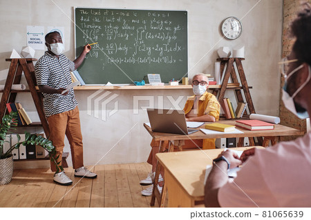 Student studying maths at school 81065639